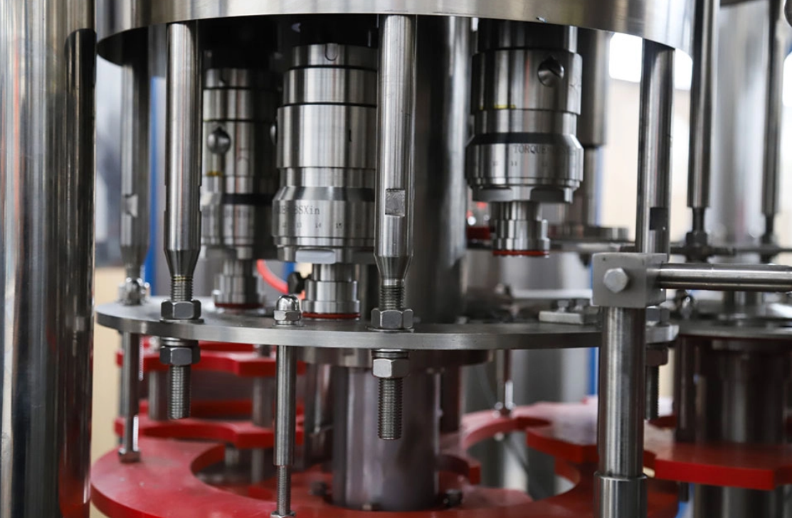 Modern water filling machine in operation, efficiently filling bottles on an automated production line