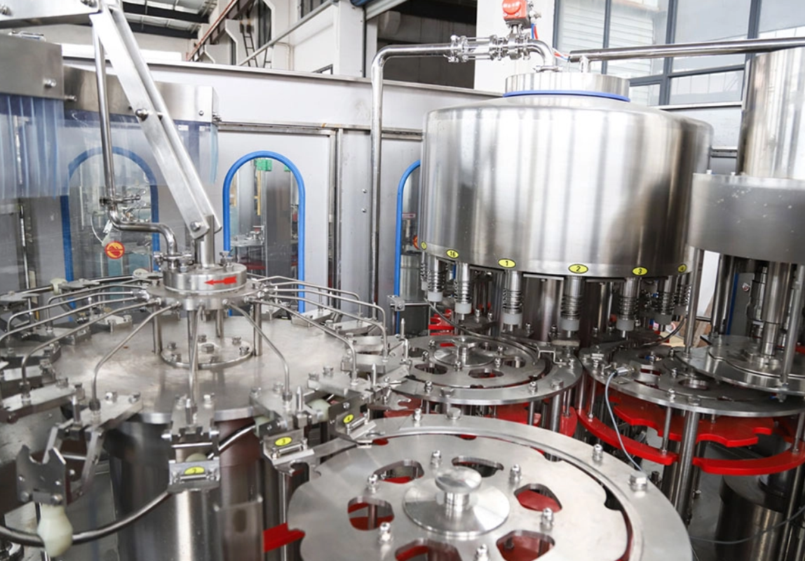 High-performance bottle filling machine operating on a modern production line, efficiently filling bottles with liquid